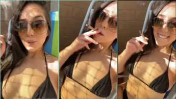 Lis Del Castilho safada fumando um cigarro de biquini