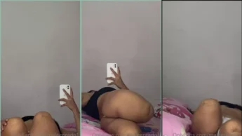 Malee Prado com o celular filmando corpão