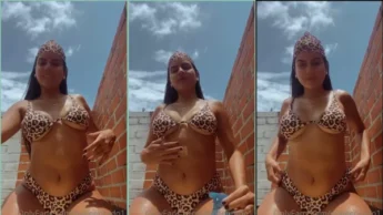 Malee Prado na laje de casa aparecendo de biquini