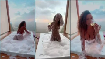 Negra gata e gostosa tomando champagne se masturbando