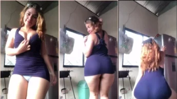 Zamy Gaibor em video de vestido roxo dançando