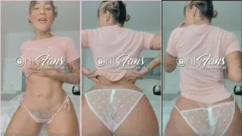 Karina Marcela de blusa e calcinha branca dançando