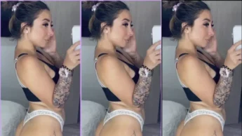 Novinha linda tatuada Laura White filmando de calcinha e sutiã