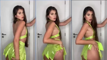 Alana Gelmi de saia verde e bundão rebolando