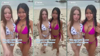 Praew Asian e a amiga gata na praia