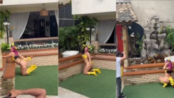 Belle Belinha sendo fotografada ali sensualmente fantasiada