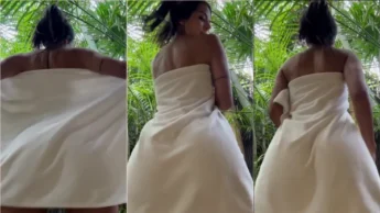 Daniela gata de rabão de toalha sensualizando