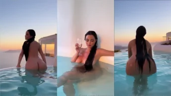 Demi Rose de bunda molhada tomando vinho na piscina
